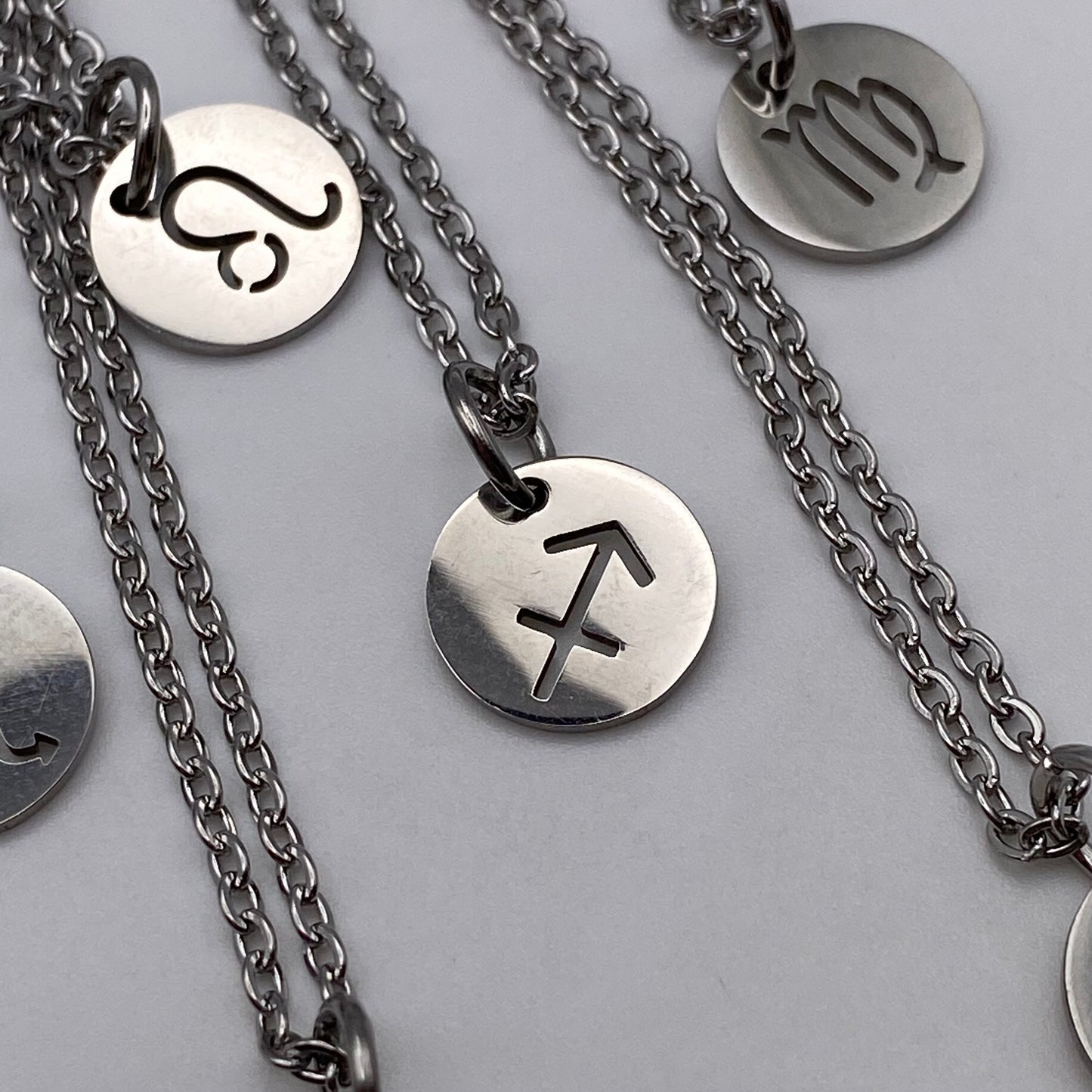 Silver Solid Star Sign Necklaces