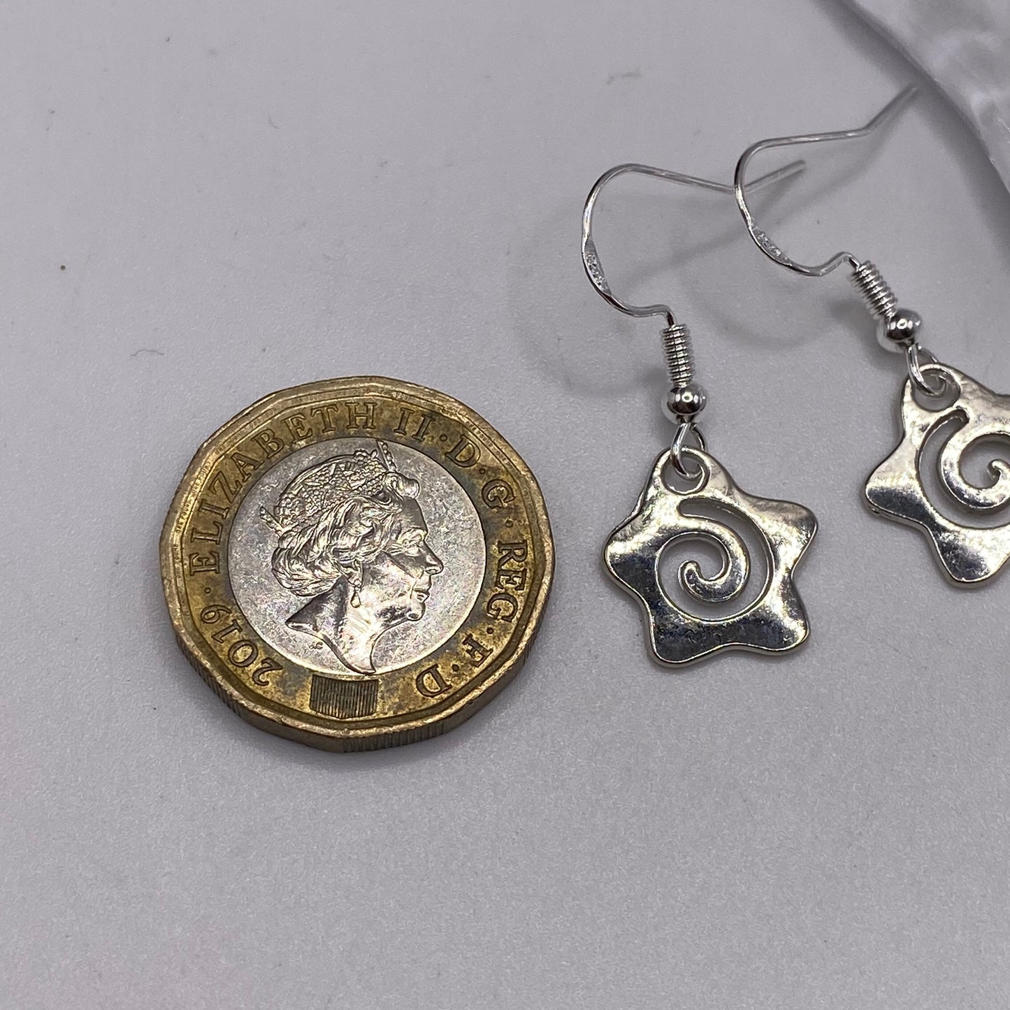 Small Star Rebirth Swirl Symbol Earrings