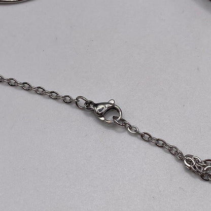 Big Rebirth Swirl Symbol Necklace