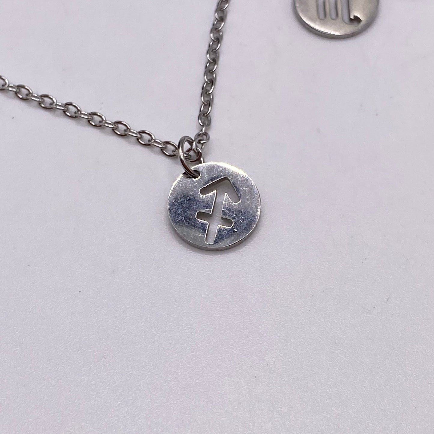 Silver Solid Star Sign Necklaces