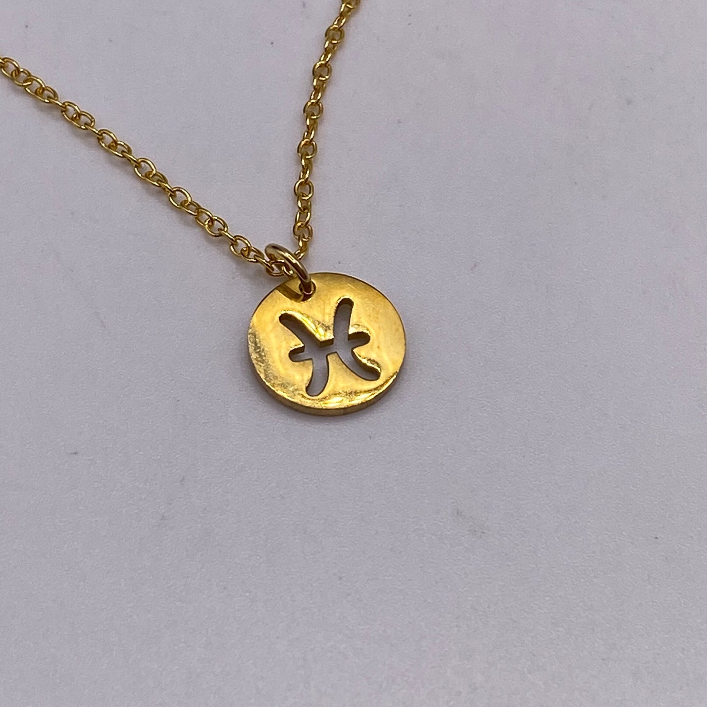 Gold Solid Star Sign Necklaces