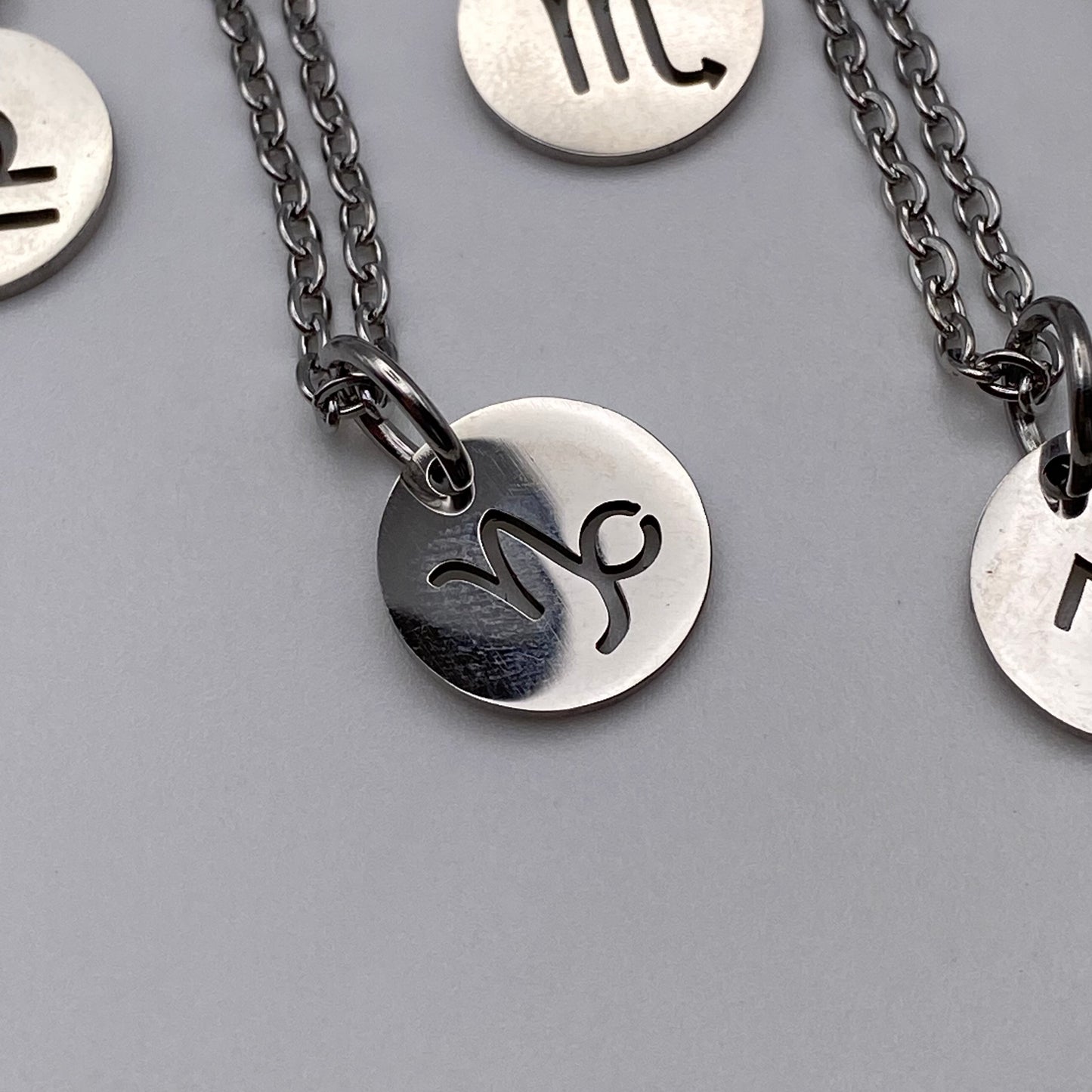 Silver Solid Star Sign Necklaces