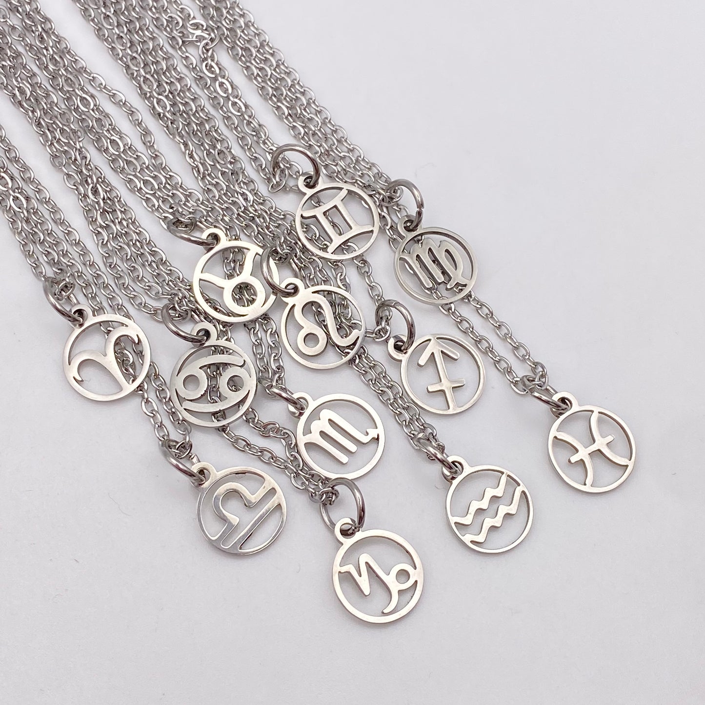 Silver Hollow Star Sign Necklaces