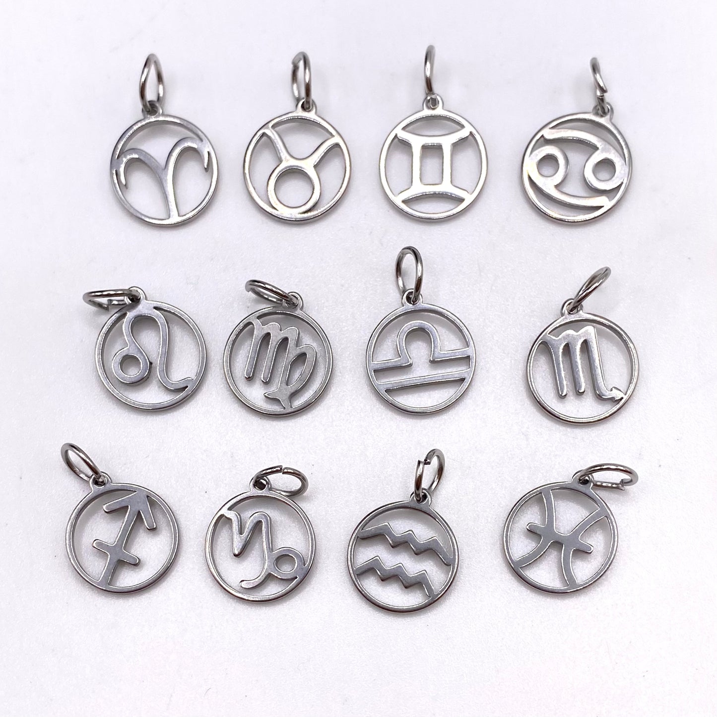 Silver Hollow Star Sign Necklaces