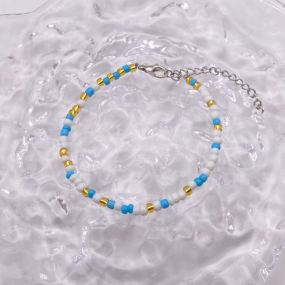 Messy Blue, White and Gold Beaded Bracelet